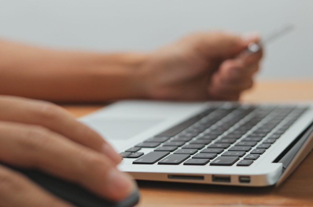 Shopping online on laptop computer